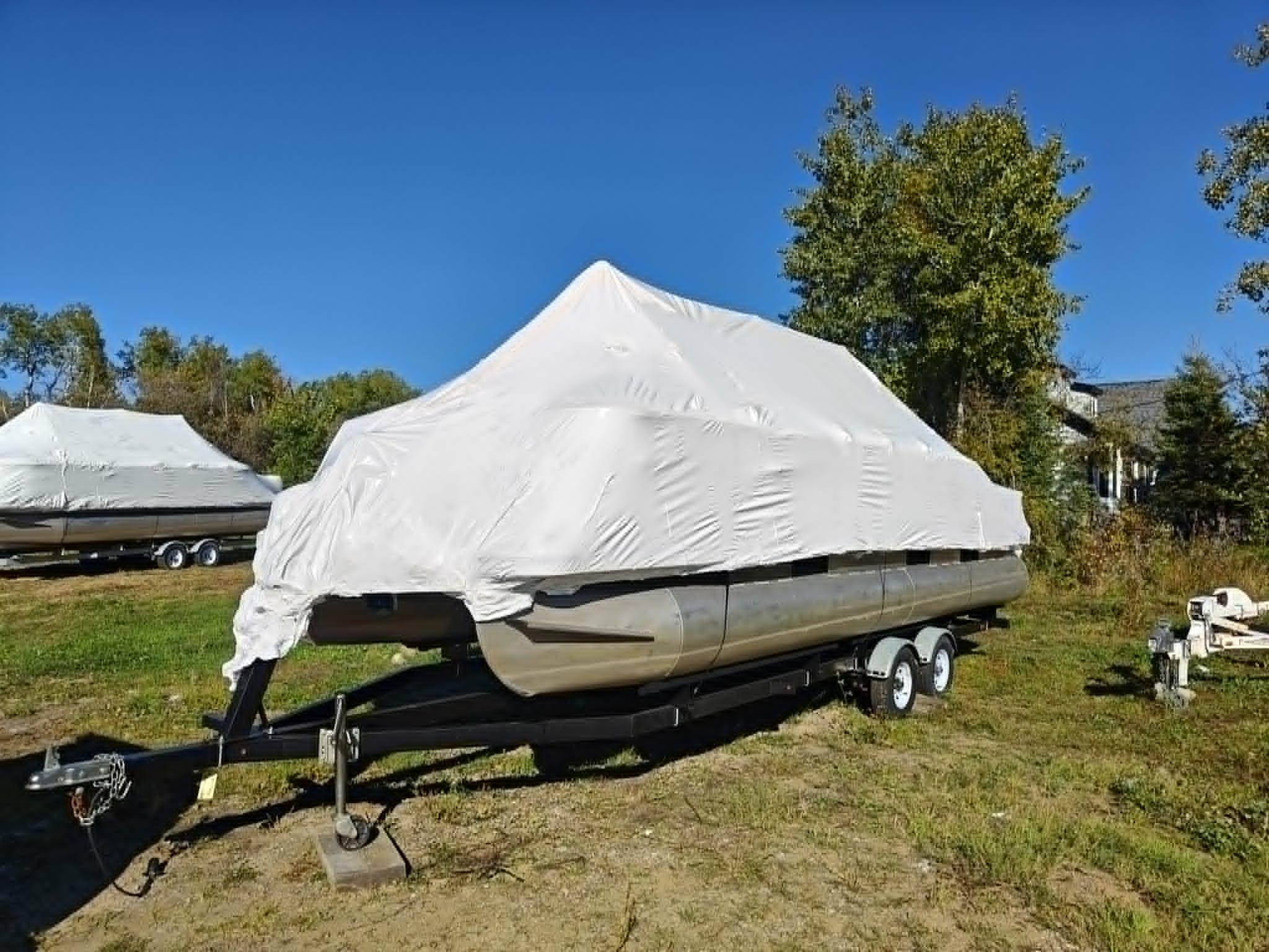 Shrink-wrapped pontoon boat
